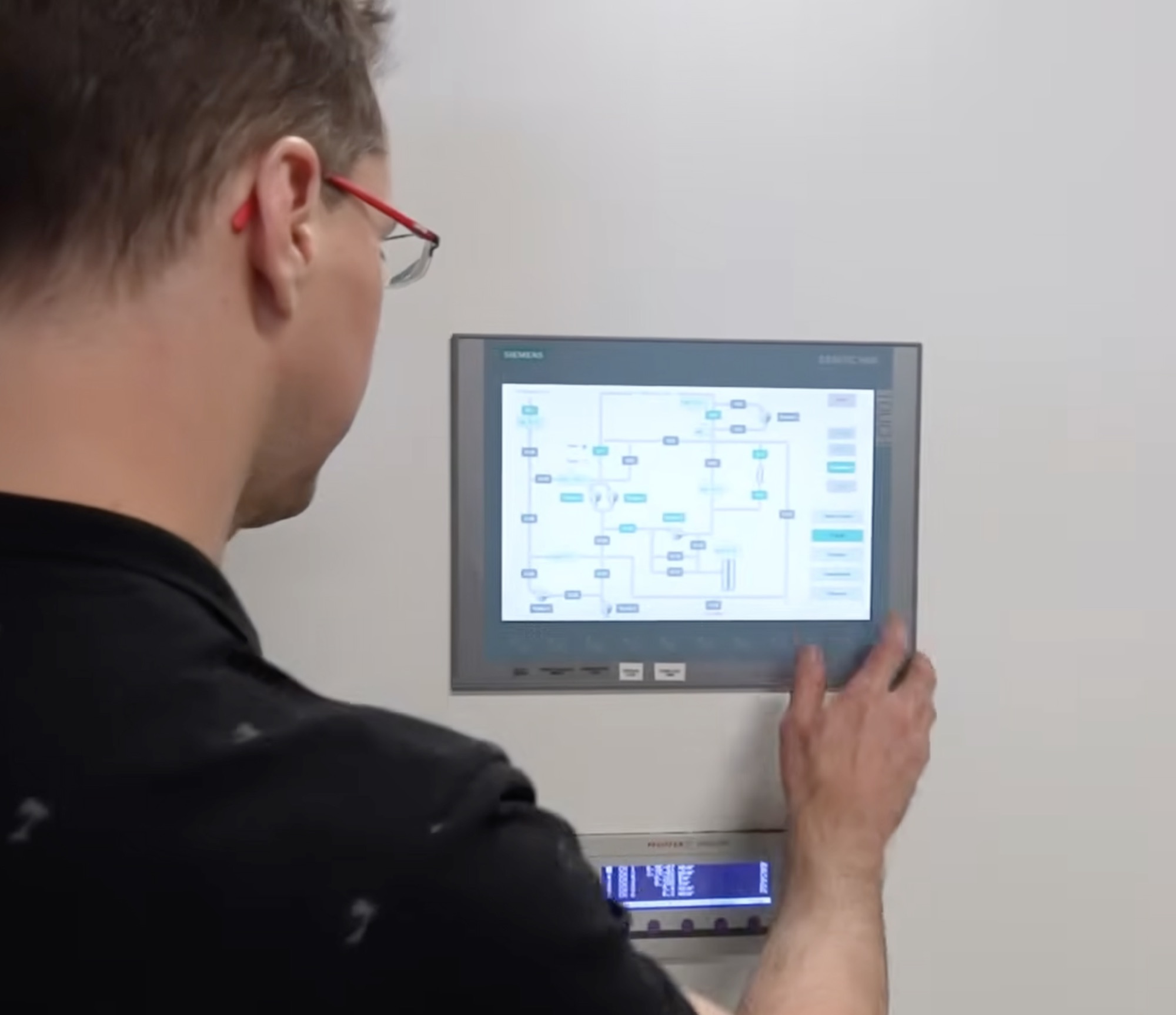 Anyon engineer at the system control panel